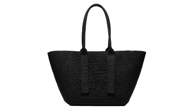 All-black textured Flyknit tote bag styled for office tailoring